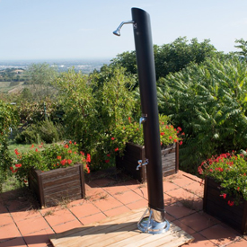 Solar shower plus wooden platform